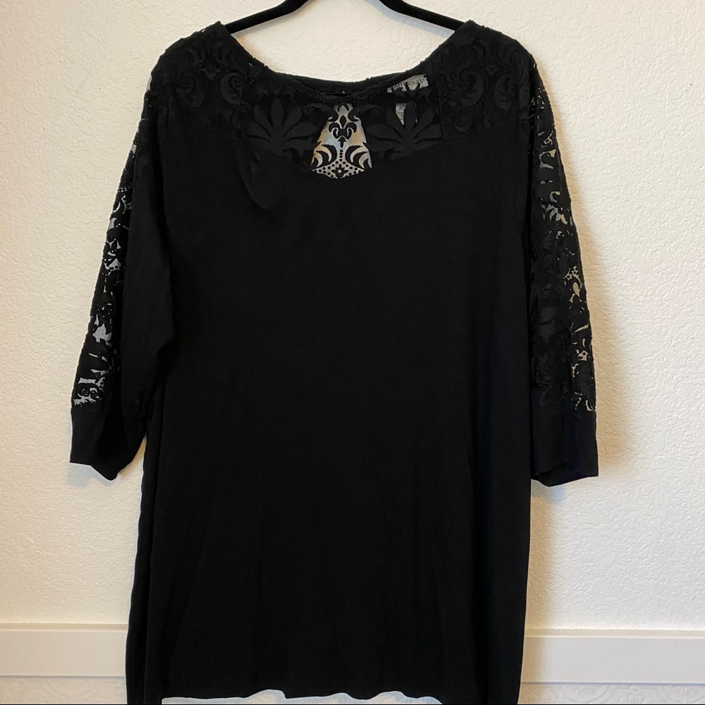 Women’s black top with see through lace design
